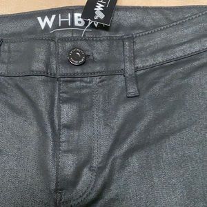 WHBM beautiful skinny jeans in black coated mid risen